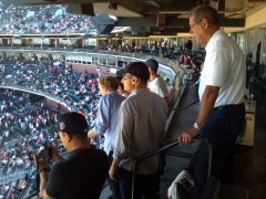 Bloggers follow the Game, AT&T Director of Corporate Communications John Britton looks on
